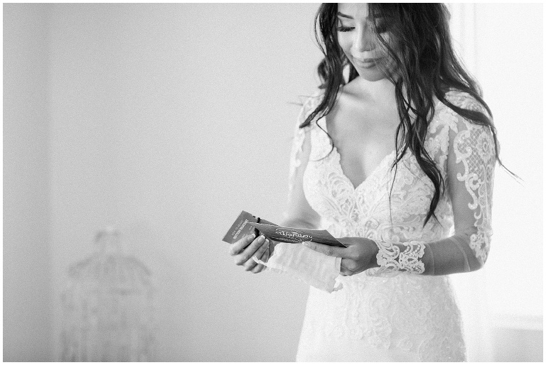 bride reading a sweet note from her groom