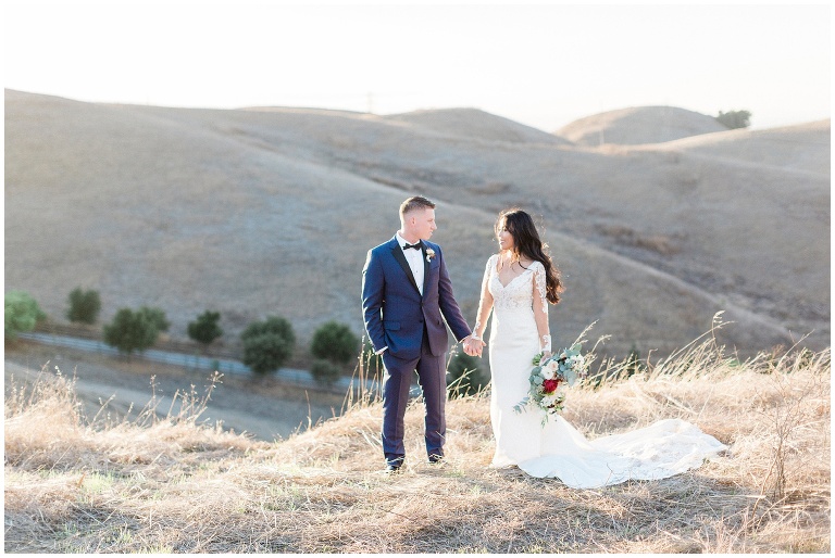 bride and groom portraits on a hill side, sunol California