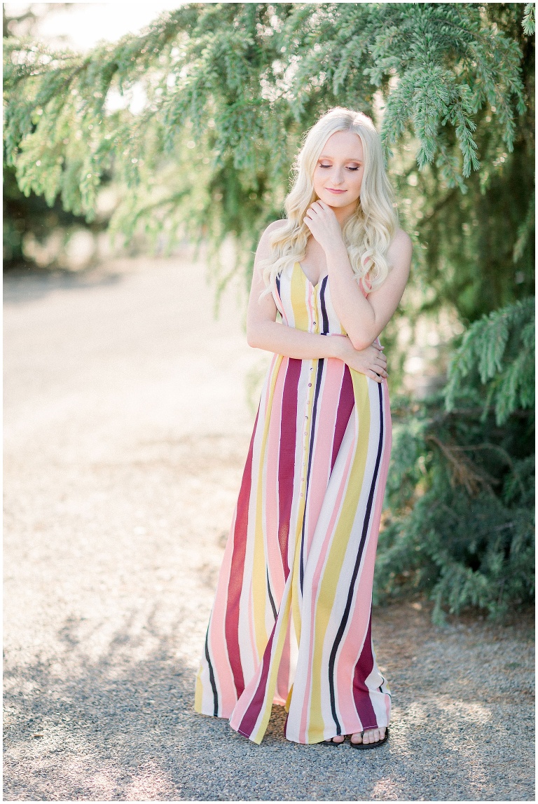 girl in a long pink and yellow dress