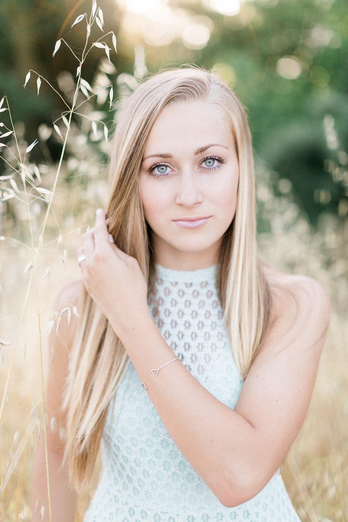 portrait of a blonde haired blue eyed teenager