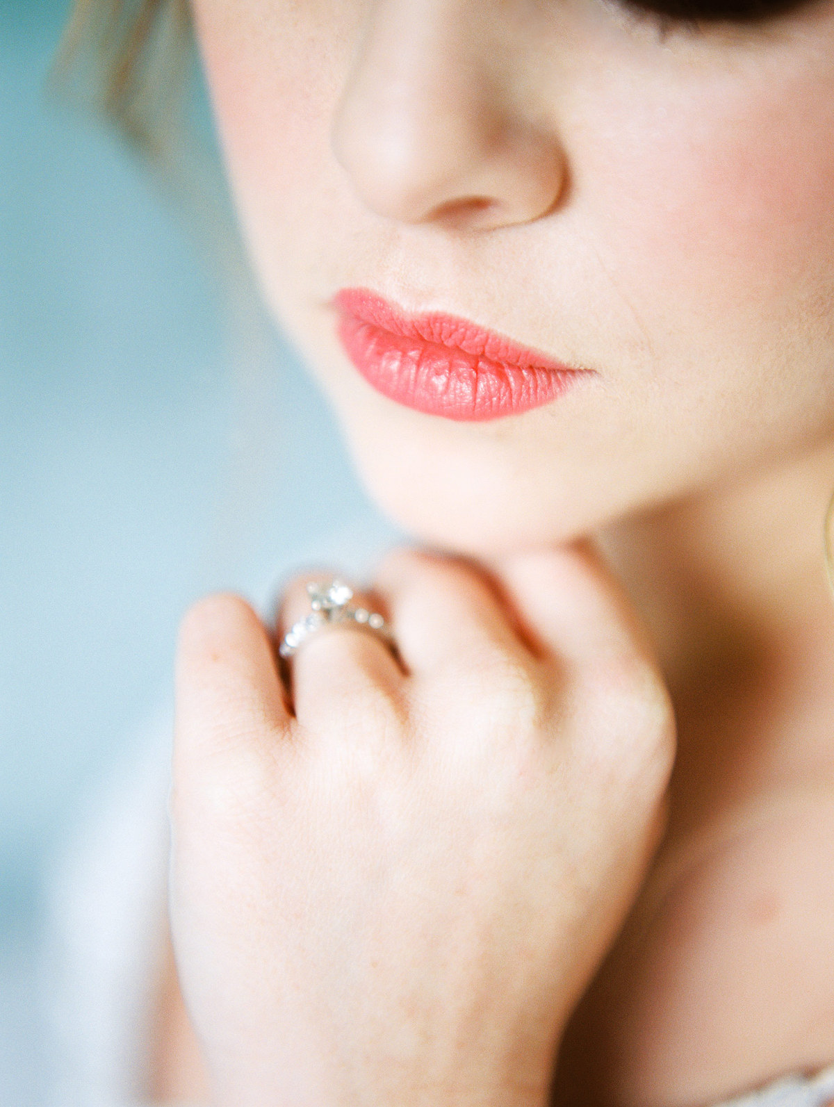 close up of bride with pouty pink lips